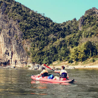 People kayaking on the river